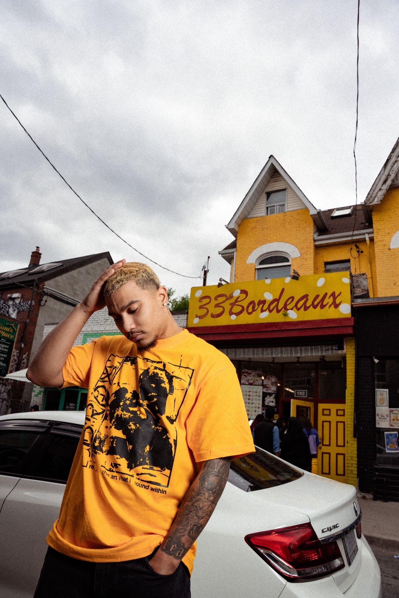 Yellow & Black "Art of Chaos" Tees