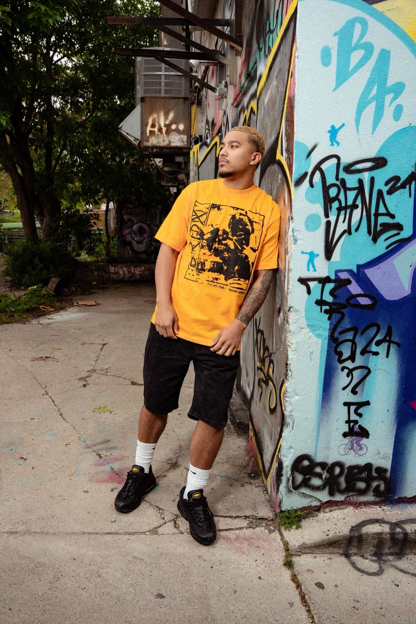 Yellow & Black "Art of Chaos" Tees